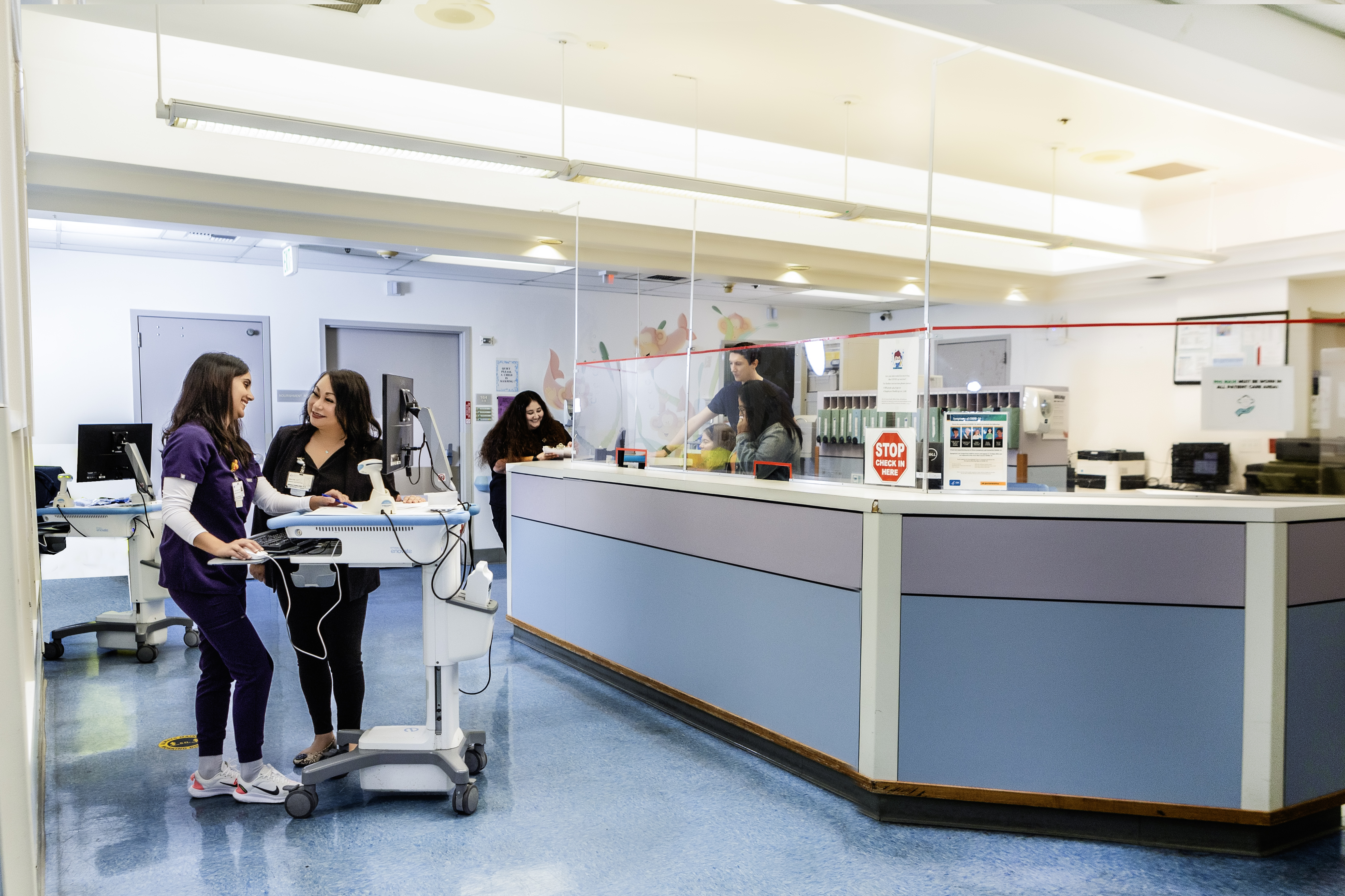 photo of staff in subacute with sea animal cartoon figures