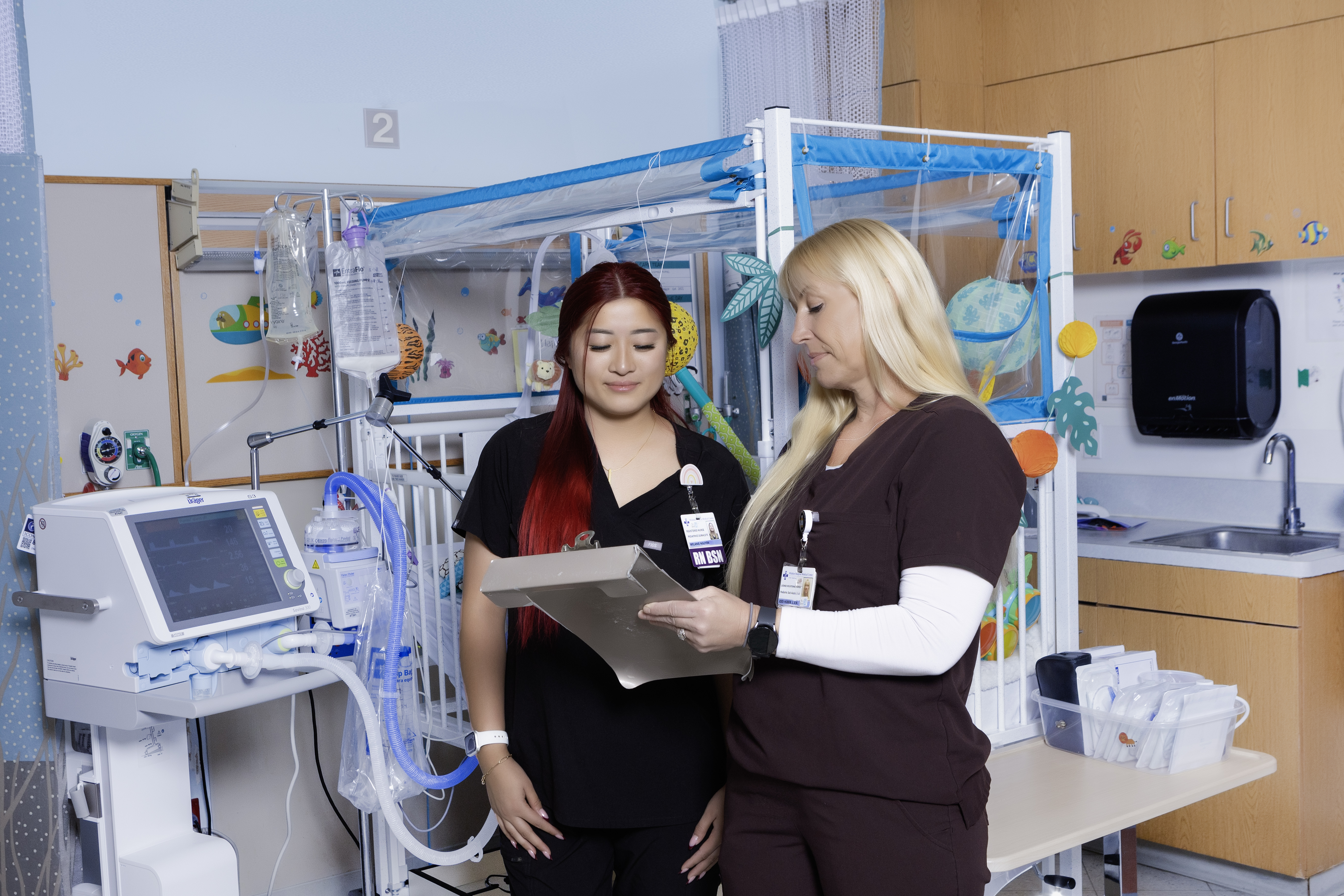 photo of nurse talking with child